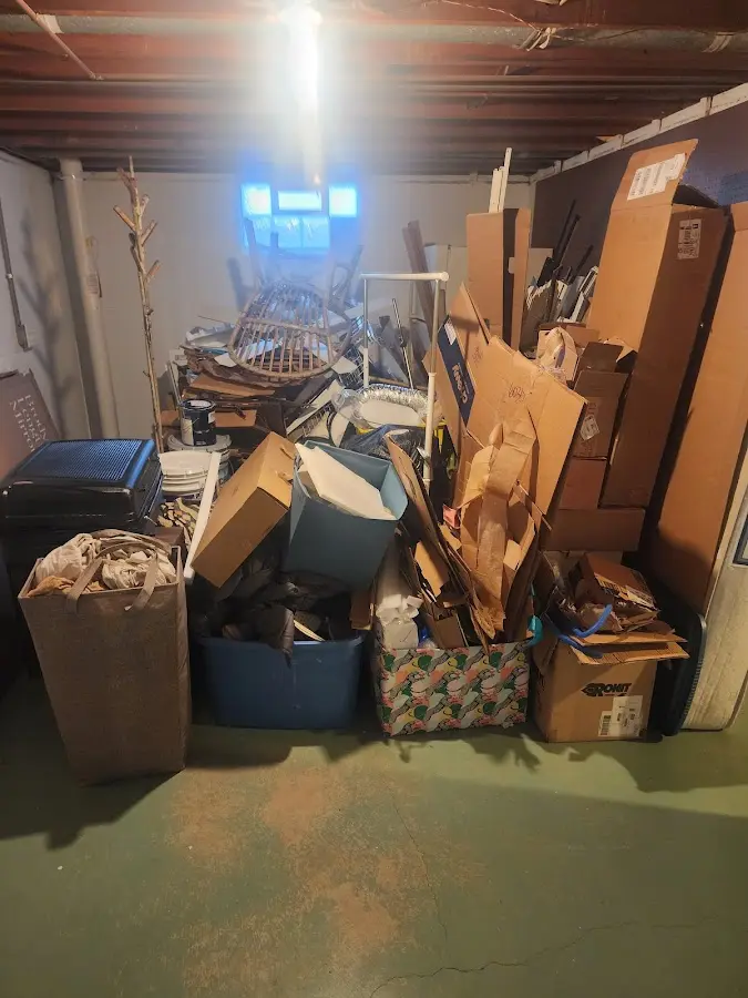 Roll-off dumpster container at job site for 6 Yard Dumpster Rental in Oak Bluffs